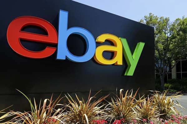 FILE - This Tuesday, July 16, 2013, file photo shows an eBay sign at eBay headquarters in San Jose, Calif. The company reports quarterly earnings on Wednesday, Oct. 16, 2013. (AP Photo/Ben Margot, File)